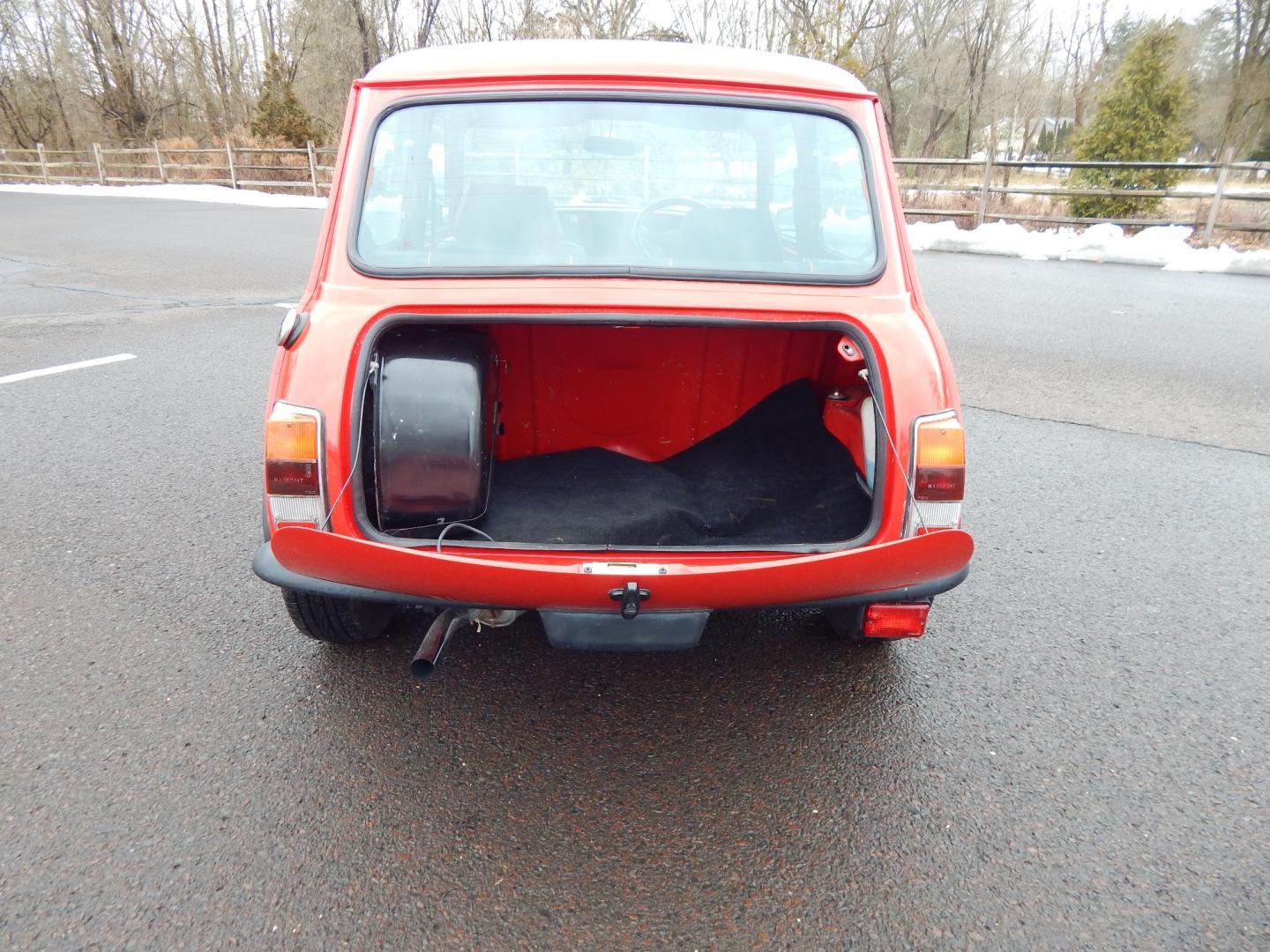 1981 RED /Black Cloth Austin Mini Cooper (AA25AU11248) with an 1275 CC engine, 4 speed manual transmission, located at 6528 Lower York Road, New Hope, PA, 18938, (215) 862-9555, 40.358707, -74.977882 - Very cool, great driving 1981 Austin Mini-Cooper. We believe it is a 1981 due to the rear taillights. The title shows it as a 1969 model year, however the cars built in the 1960s had outside door hinges. Also , the windows were sliding instead of the roll up windows this vehicle has.. Red/ whit - Photo#5